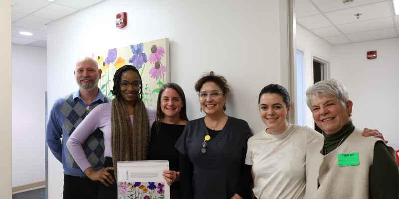 Andrea Downs stands with staff from Planned Parenthood